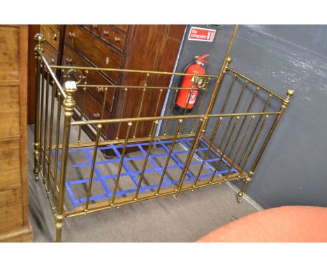 Late 19th or early 20th Century brass cot of rail form, 145cm wide