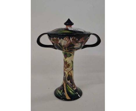 A Moorcroft Art Nouveau shaped vase and cover in the Symphony pattern, made for the MCC, signed by Emma Bossons, 20cm high