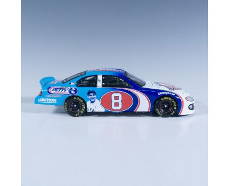 Die-cast metal with plastic parts, 1:24 scale replica of the Yankee 100th Anniversary NASCAR racer. What's nice is that both 