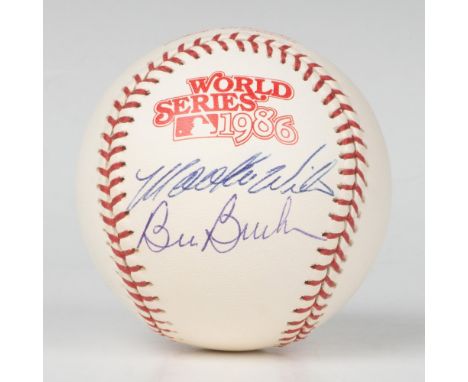 Official World Series 1986 baseball signed by Mookie Wilson and Bill Buckner. Rawlings backstamp. Certificate of Authenticity