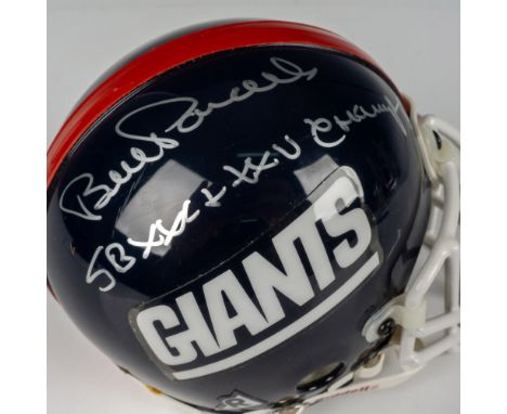 This NY Giants collector's mini helmet from Riddell is certified by T. Wall Collectibles. The autograph in the side reads Bil