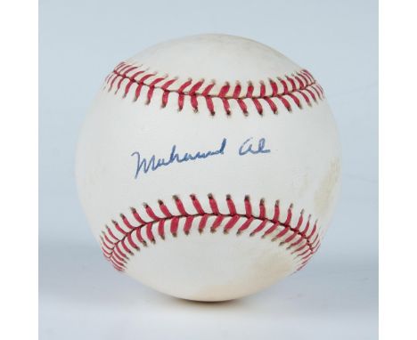 This is an official 1994 World Series baseball hand-signed by boxing legend Muhammad Ali. Certificate of Authenticity from Ju