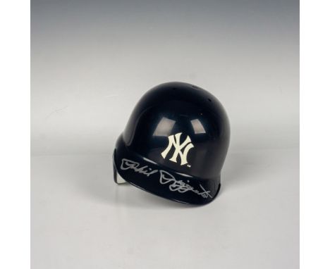This NY Yankees collector's mini helmet from Riddell is signed by Phil Rizzuto witnessed and authenticated by T. Wall Collect