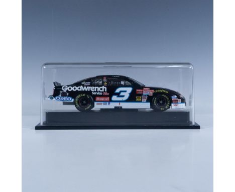 Die-cast metal with plastic parts, 1:24 scale replica of the NASCAR racer. This item has a plastic base with removable cover 