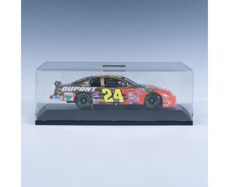 Die-cast metal with plastic parts, 1:24 scale replica of the Monte Carlo racer. Made in China. This item has a plastic base w