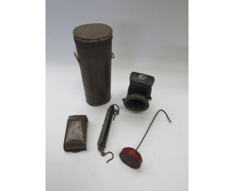 A paraffin bike lamp, LNER ash tray, postal scales SNCF canister and receipt hook