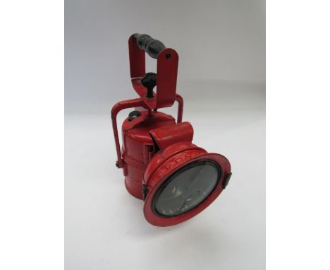 A red painted B.R inspection lamp, stamped BR to the side, front glass a/f