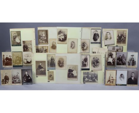 A quantity of assorted vintage photographs, contained in albums &amp; loose.
