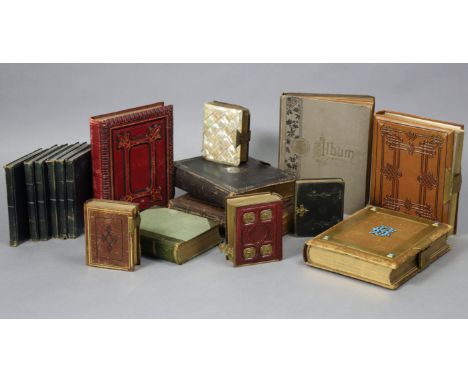 Seventeen various vintage photograph albums.