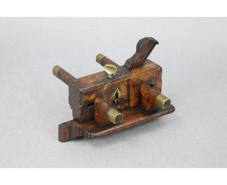 An early 20th century wooden plough plane with brass fittings, 8¾” wide; together with various other hand tools; two 110V lig