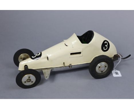 A vintage Rowell Motors Ltd. of Dundee petrol-driven painted metal model sports car, 16” long.