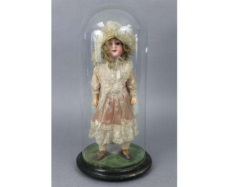 An Armand Marseille bisque-head girl doll (O R G M 246/1 A 2½ M) with brown sleeping eyes, open mouth, &amp; composition body