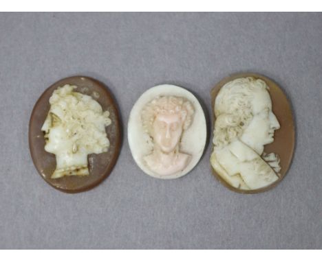 Three carved hardstone small oval cameos, the first of an 18th century gentleman in profile (w.a.f.); the other two of classi