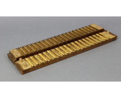A vintage “Karl Hart Schwetzingen” (German) hardwood cigar mould (for twenty cigars) “No. 28629”, 22” long.