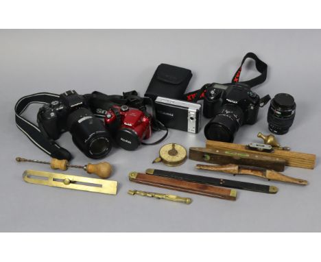 Three cameras; various camera accessories; &amp; various hand tools.