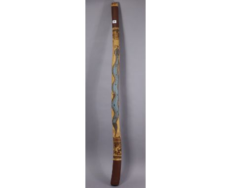 A painted &amp; carved wooden didgeridoo inscribed “Burbirra, Lloyd Nolan”.