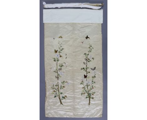 A Chinese/Japanese gold silk scroll with embroidered floral, bird, &amp; insect decoration to both sides, 45” x 27”.