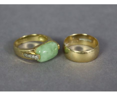 A 9ct. gold ring set oblong jade; &amp; a 9ct. gold plain wedding band.