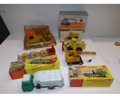 Dinky:- 978 refuse wagon, 936 Leyland chassis, 977 shovel dozer, 571 mobile crane and 978 tractor dozer each chipped and boxe