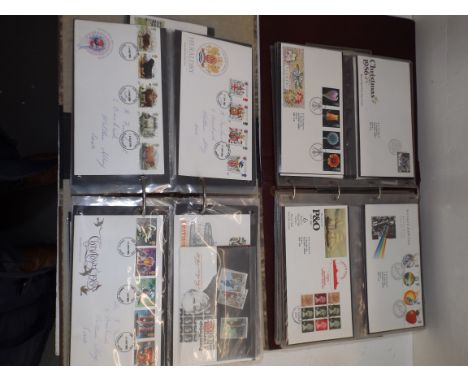 Two albums of first day covers.