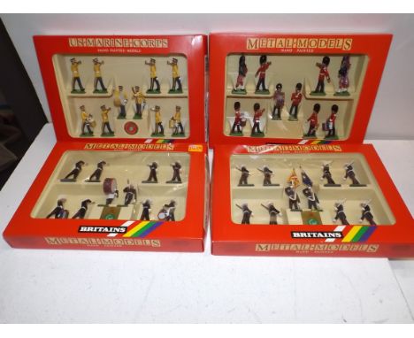 Britains:- Four military bands, 7204 Royal Marines, 7202 Royal Marines, 7206 Scots Guards, these boxed, and USA Army 1950's D