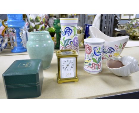 Five pieces of Poole pottery, Gucci wristwatch, Gucci lighter, Adidas wristwatch and a brass carriage clock 