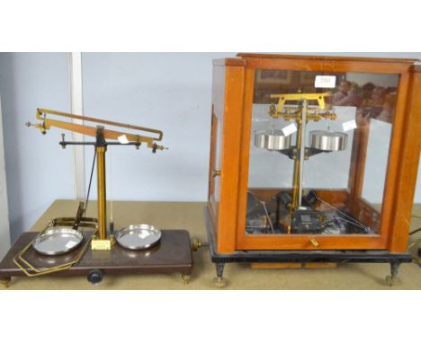 Two sets of  laboratory scales 