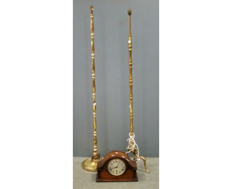 Two brass standard lamps and an oak cased mantel clock 