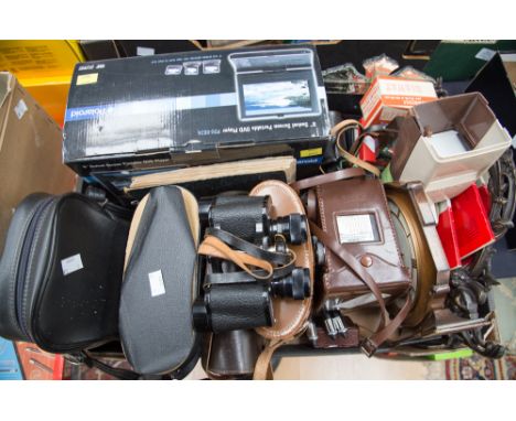 A boxed Polaroid 8 inch swivel screen portable DVD player with assorted cameras, and binoculars etc (1 box)