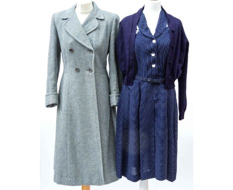 A 1940s duck egg blue herringbone tweed coat by Gillie, a polka dot 1940s dress and a 1990s navy Fenn Wright & Manson cardiga