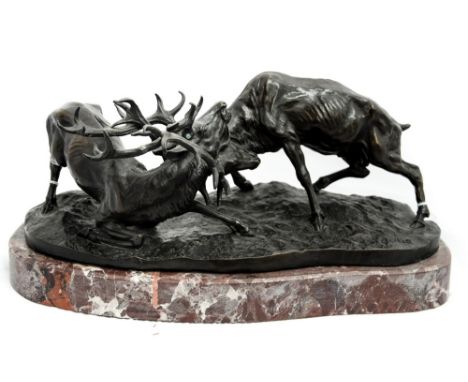 Bronze figure of two rutting stags after PJ Mene signed in the cast, on marble base, approx. 40 cm wide