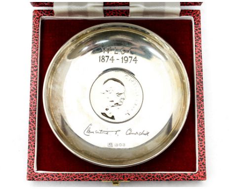 A silver dish by R & D with London hallmarks to commemorate the life of W.L.S-C 1874-1974, 2.4ozt, 74.9 grms approx., the cen