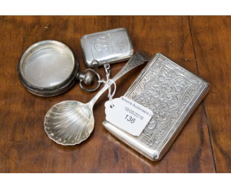 A silver vesta case Birmingham 1910, a continental white metal snuff box , a silver watch case and a small silver cream ladle