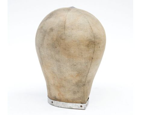 A vintage wig stand,1890-1900, unusual antique canvas on wood with metal band around the base