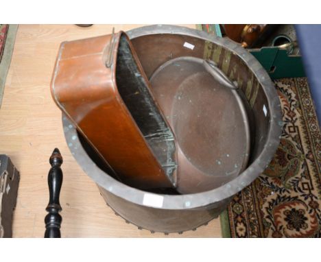 Three copper pans and planter,