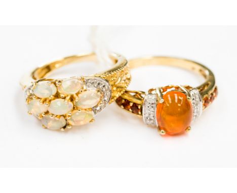 Two dress rings set with opals and fire opal etc (2)