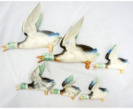 Poole pottery wall mounted flying ducks, graduated set of six