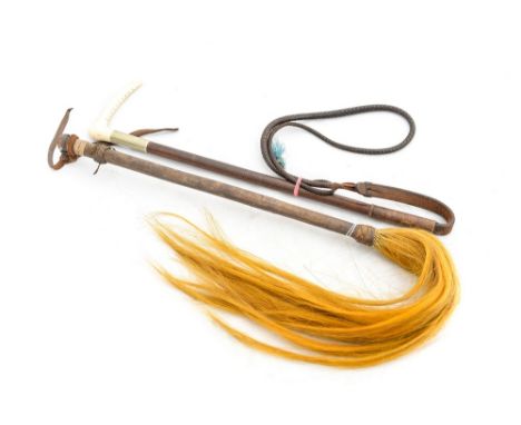 A riding/hunting crop and fly swat