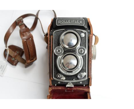 A vintage cased Rolleiflex camera