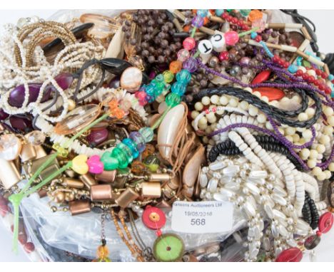 A bag of necklaces, ethnic glass, vintage etc