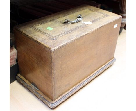 An early 20th Century sewing machine inscribed 'Trademark' ES09453 fitted in a mahogany and parquetry inlaid case, together w