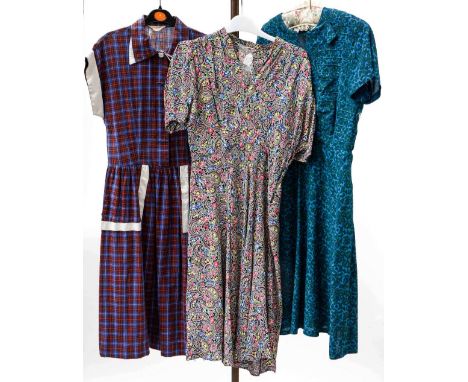 A selection of clothing to include a pale pink late 1940s blouse and two floral bed jackets (1940s and 1950s), a pale peach q