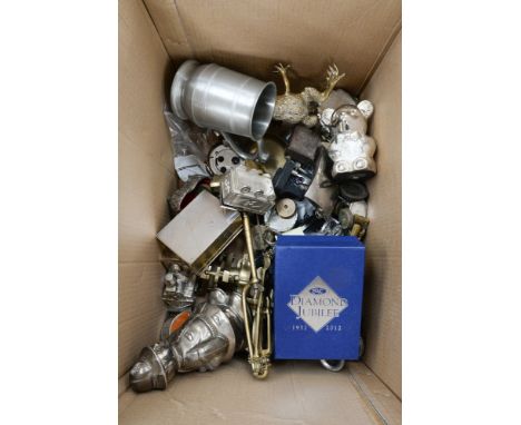 A quantity of silver plated, white and yellow metal items to include a brass theodolite, brass scales, white metal figures et