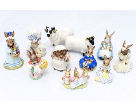 Nine Royal Doulton, Royal Albert and Beswick, Beatrix Potter figurines together with two Beswick rams 