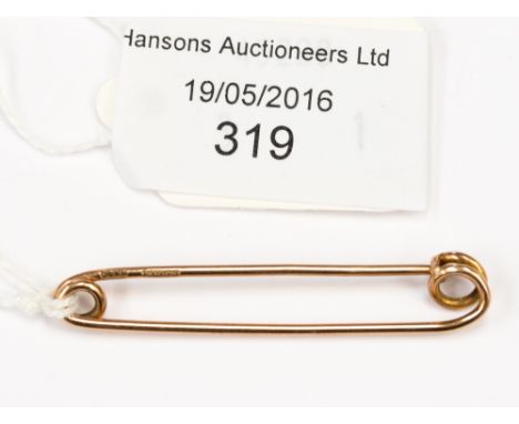A 9ct gold 0.375 pin (scarf clip) 2.2 grms approx.