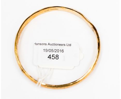 A 9ct gold bangle, 9.5 grms approx.