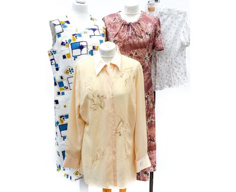 A cream crepe blouse with embroidered floral details and satin collar and cuffs 1970s, a pink polyester early 1980s dress wit