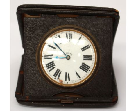 An eight day travel clock with enamel dial, late 19th/early 20th Century