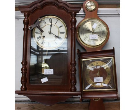 Two modern clocks and barometer along with a 1950s mantle clock