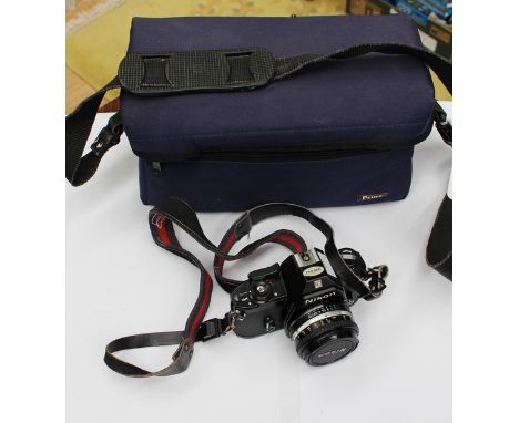 Vintage Nikon camera, 50mm lens with bag